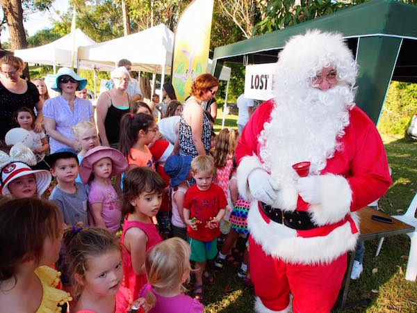 Santa visiting at the Ryde Rotary Carols